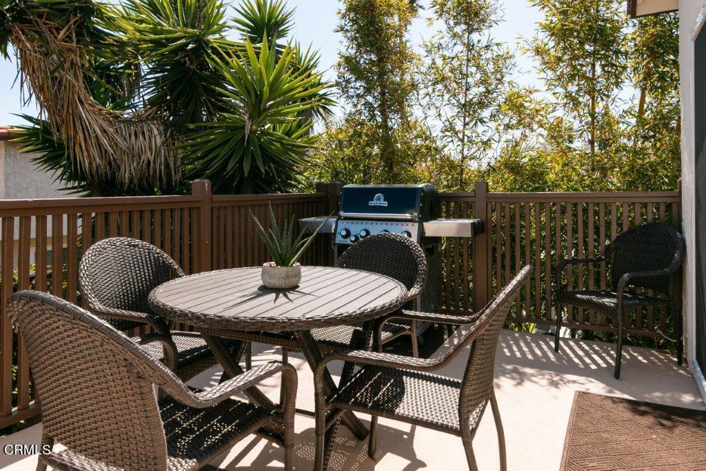 5000 Dolphin Way Oxnard, CA 93035 - Photo 18 of 56 a view of a dinning table and chairs in the patio