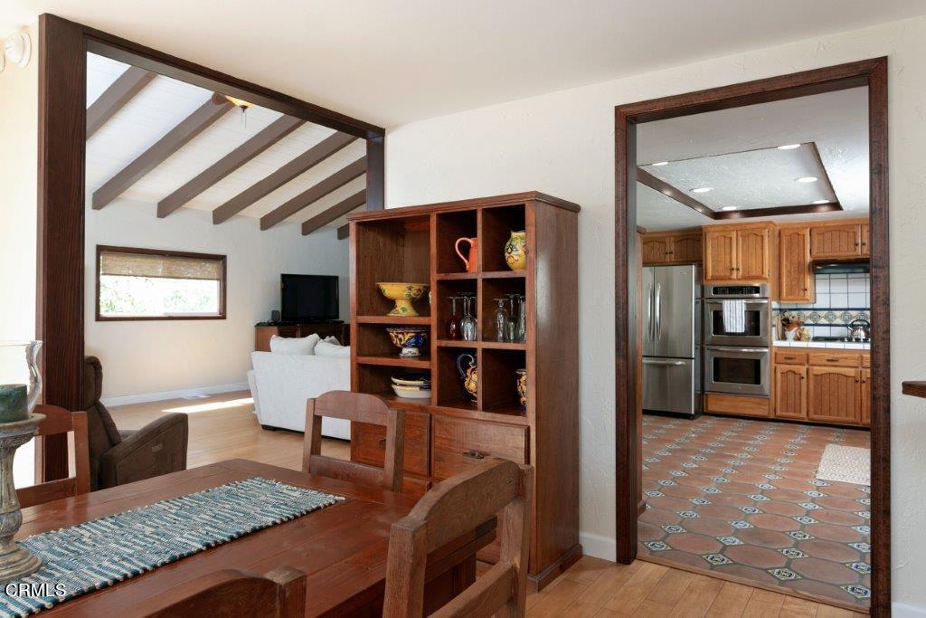 5000 Dolphin Way Oxnard, CA 93035 - Photo 21 of 56 a living room with furniture and a kitchen view