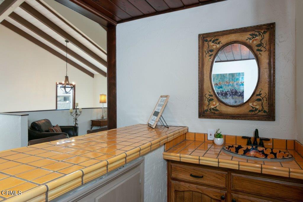 5000 Dolphin Way Oxnard, CA 93035 - Photo 29 of 56 a bathroom with a sink and a mirror