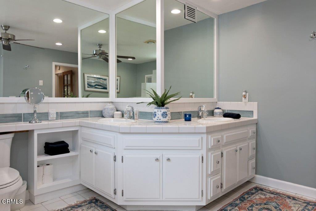 5000 Dolphin Way Oxnard, CA 93035 - Photo 34 of 56 a bathroom with a sink and a mirror