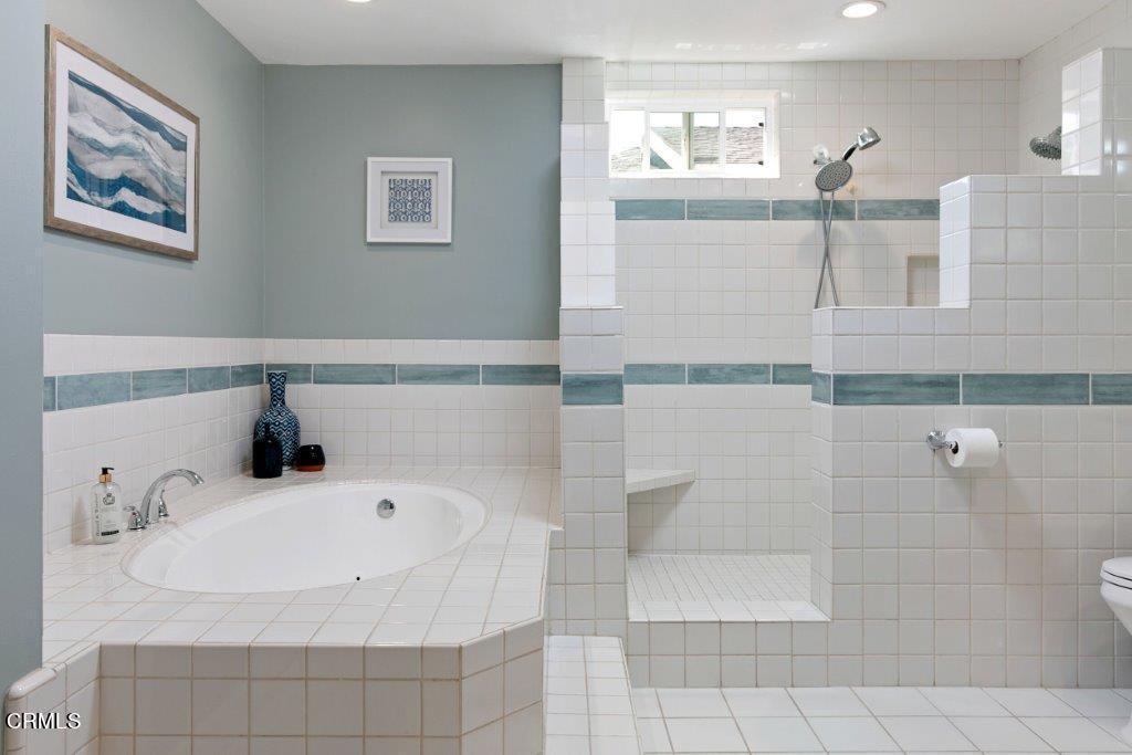 5000 Dolphin Way Oxnard, CA 93035 - Photo 35 of 56 a bathroom with a bathtub and a sink