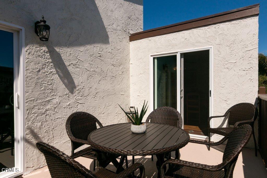 5000 Dolphin Way Oxnard, CA 93035 - Photo 39 of 56 a view of a dining room with furniture and wooden floor