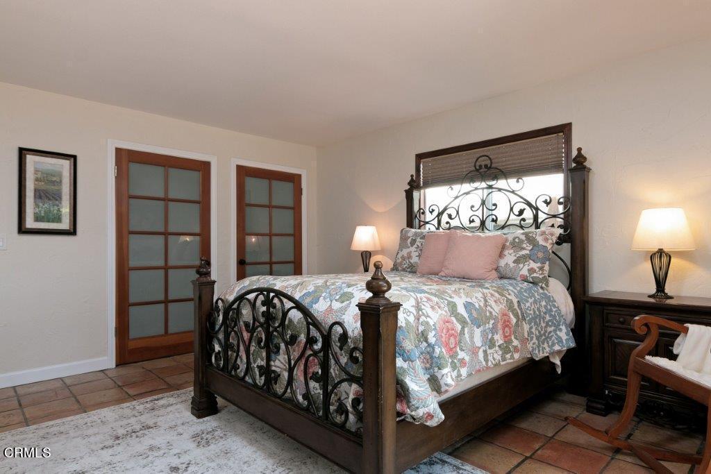 5000 Dolphin Way Oxnard, CA 93035 - Photo 40 of 56 a bedroom with a bed and window