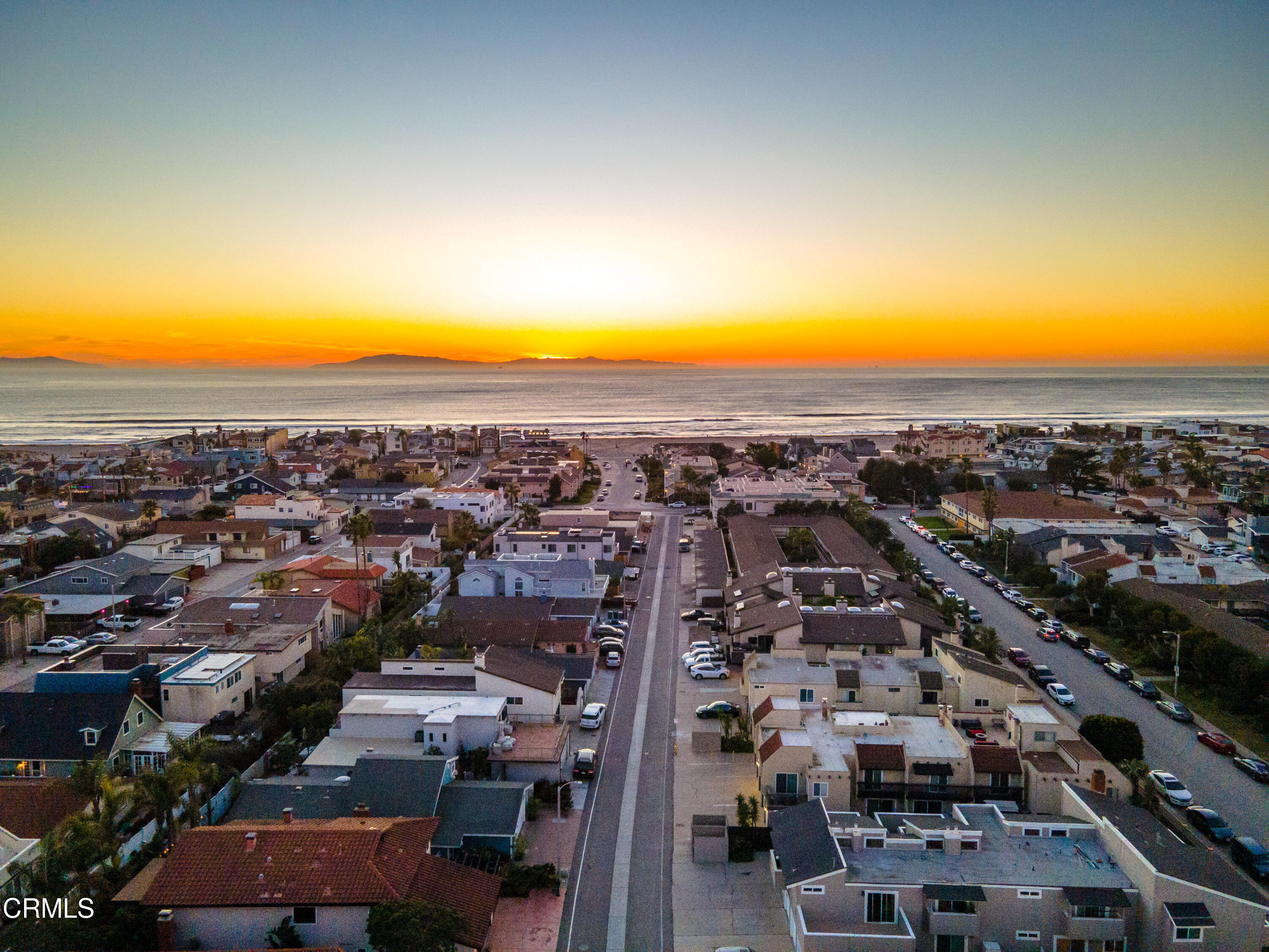 5000 Dolphin Way Oxnard, CA 93035 - Photo 56 of 56 an aerial view of a city with lots of residential buildings and ocean view