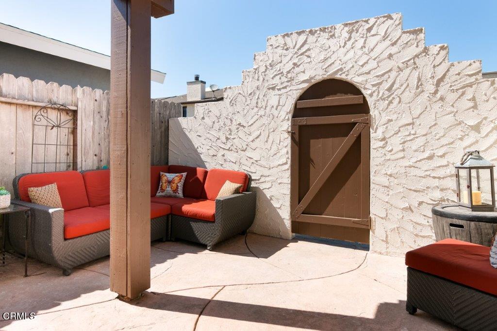 5000 Dolphin Way Oxnard, CA 93035 - Photo 6 of 56 a view of living room couch and a fireplace