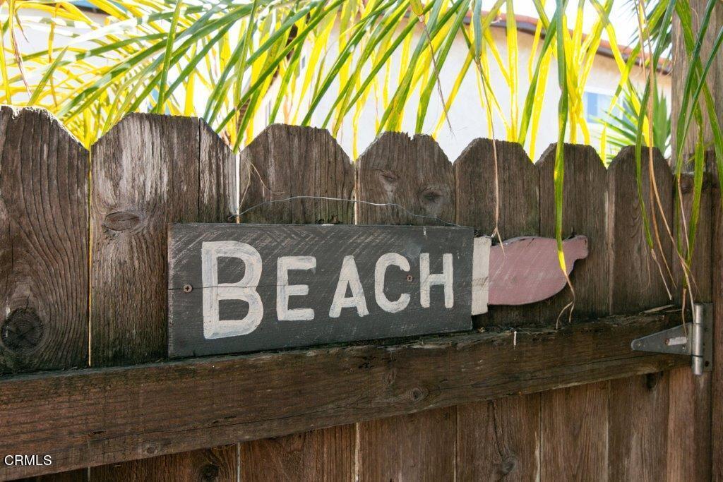 5000 Dolphin Way Oxnard, CA 93035 - Photo 8 of 56 a street sign that is on a wooden wall