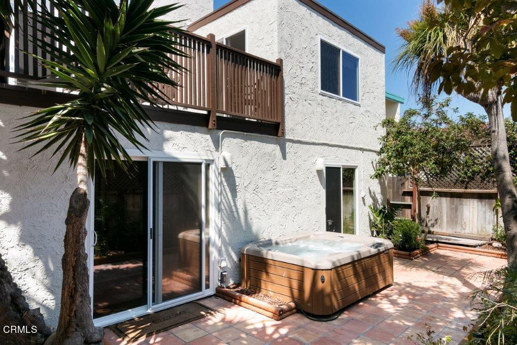 5000 Dolphin Way Oxnard, CA 93035 - Photo 10 of 56 a view of a house with backyard and a tree