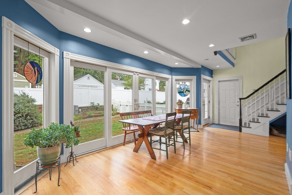 600 East Street Dedham, MA 02026 - Photo 12 of 39 a view of a dining room with furniture window and wooden floor