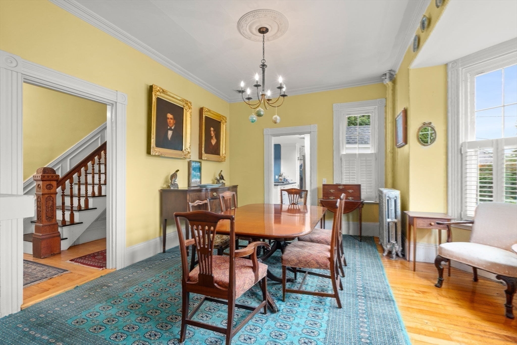 600 East Street Dedham, MA 02026 - Photo 17 of 39 a view of a dining room with furniture window and wooden floor