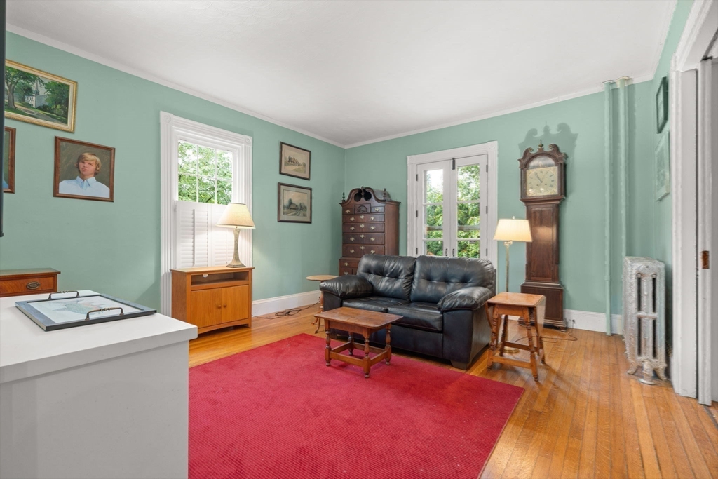 600 East Street Dedham, MA 02026 - Photo 19 of 39 a living room with furniture and a window