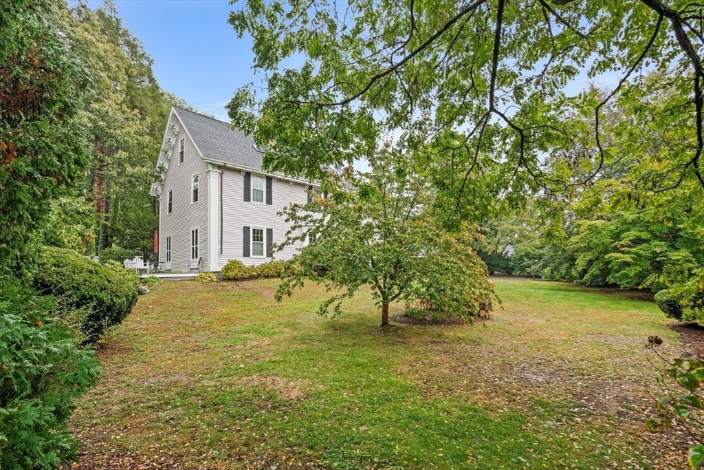 600 East Street Dedham, MA 02026 - Photo 2 of 39 a view of a yard in front of a house