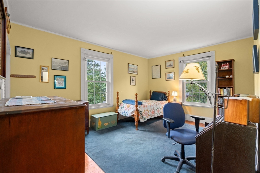600 East Street Dedham, MA 02026 - Photo 23 of 39 a view of a workspace with a window and dining room