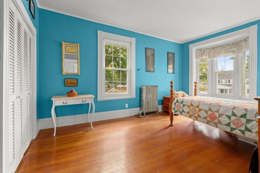 600 East Street Dedham, MA 02026 - Photo 29 of 39 a bedroom with a bed and a window