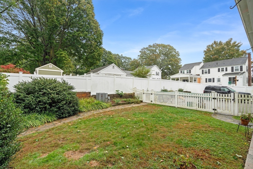600 East Street Dedham, MA 02026 - Photo 37 of 39 a view of a house with backyard and sitting area