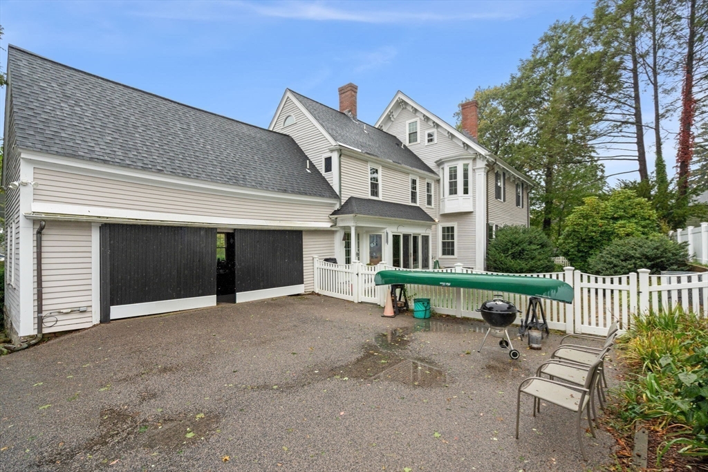 600 East Street Dedham, MA 02026 - Photo 38 of 39 front view of a house with a bench
