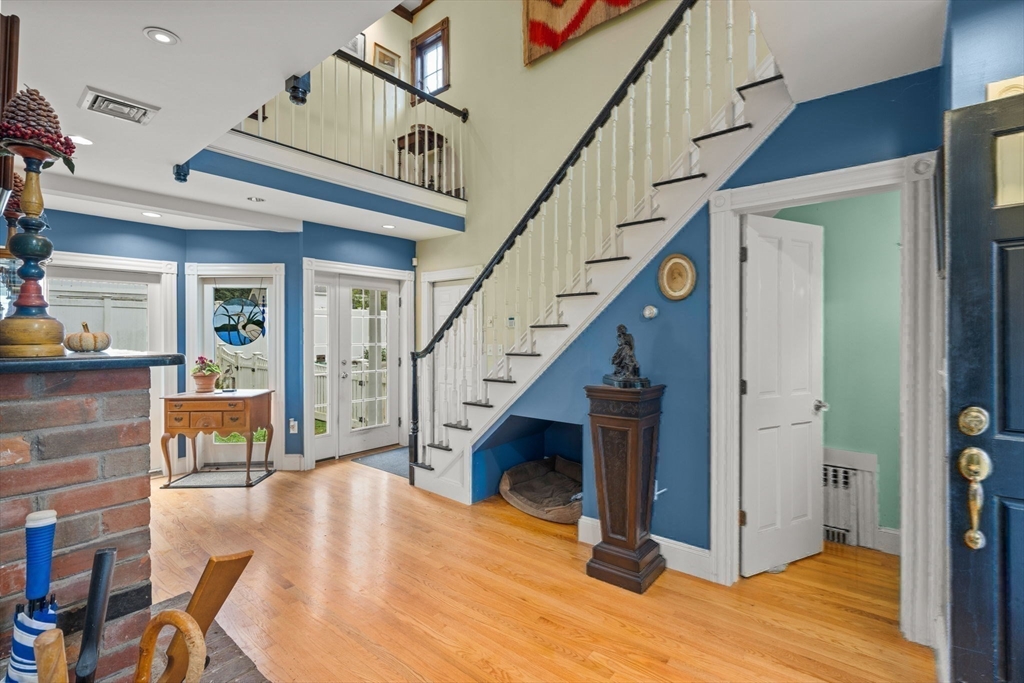 600 East Street Dedham, MA 02026 - Photo 8 of 39 a view of entryway and hall with wooden floor