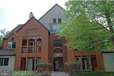4950 Columbia Road, Unit 3 21 Columbia, MD 21044 - Photo 1 of 9 front view of a house with an outdoor space