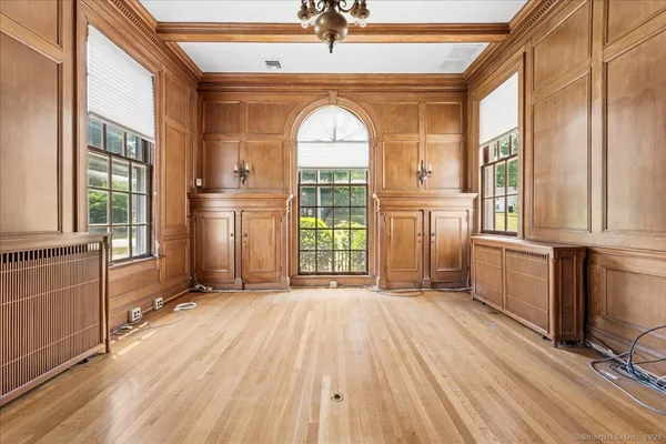 a view of entryway with wooden floor