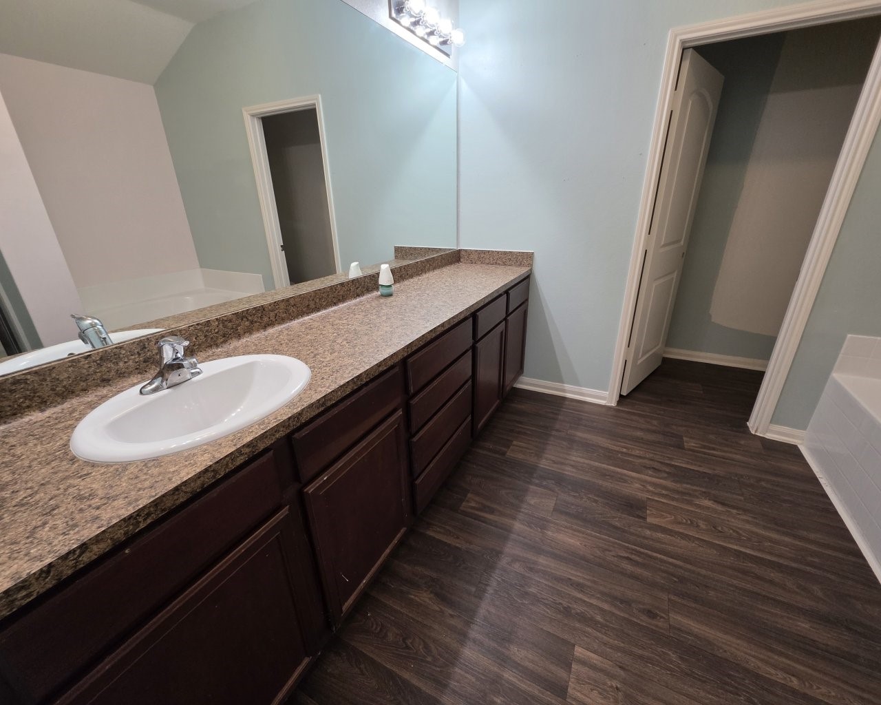 2709 Calypso Place La Marque, TX 77568 - Photo 11 of 21 a bathroom with a double vanity sink and a mirror
