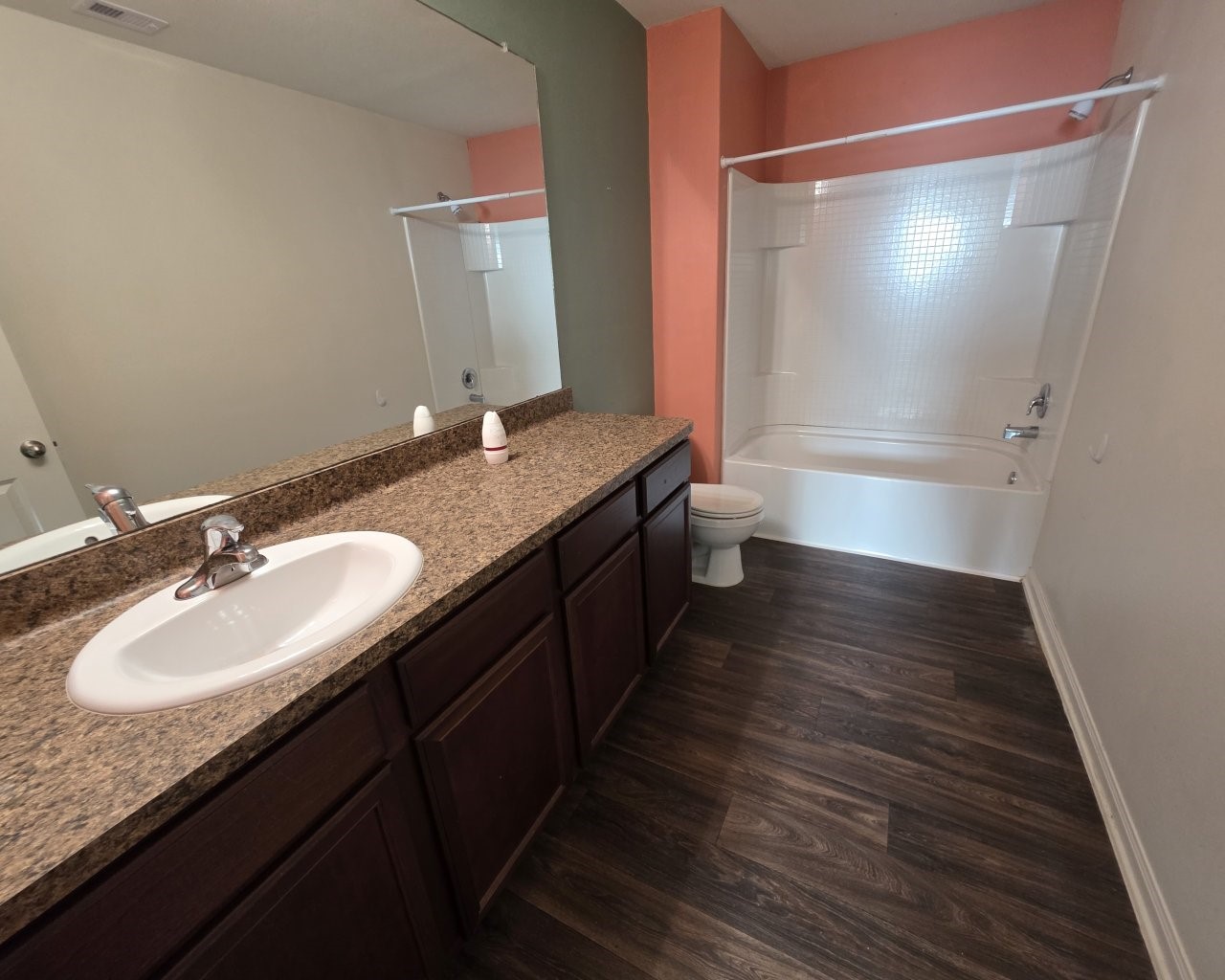2709 Calypso Place La Marque, TX 77568 - Photo 16 of 21 a bathroom with a double vanity sink and mirror