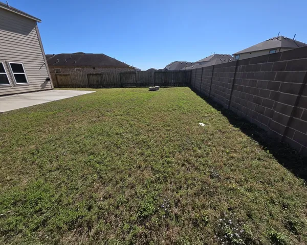 a house view with a garden space