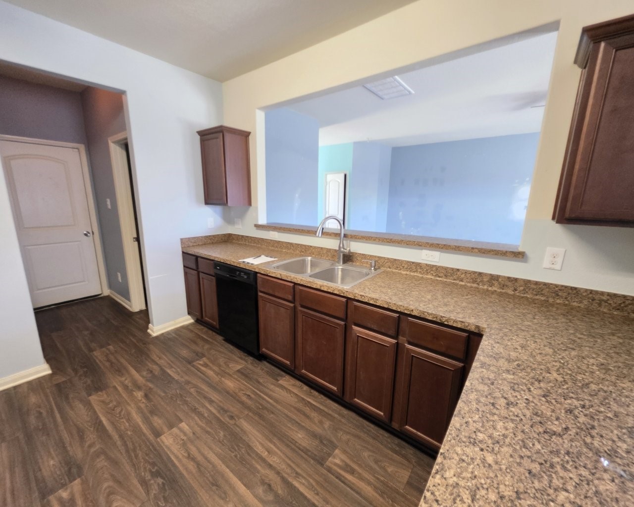 2709 Calypso Place La Marque, TX 77568 - Photo 3 of 21 a kitchen with a sink and a stove top oven