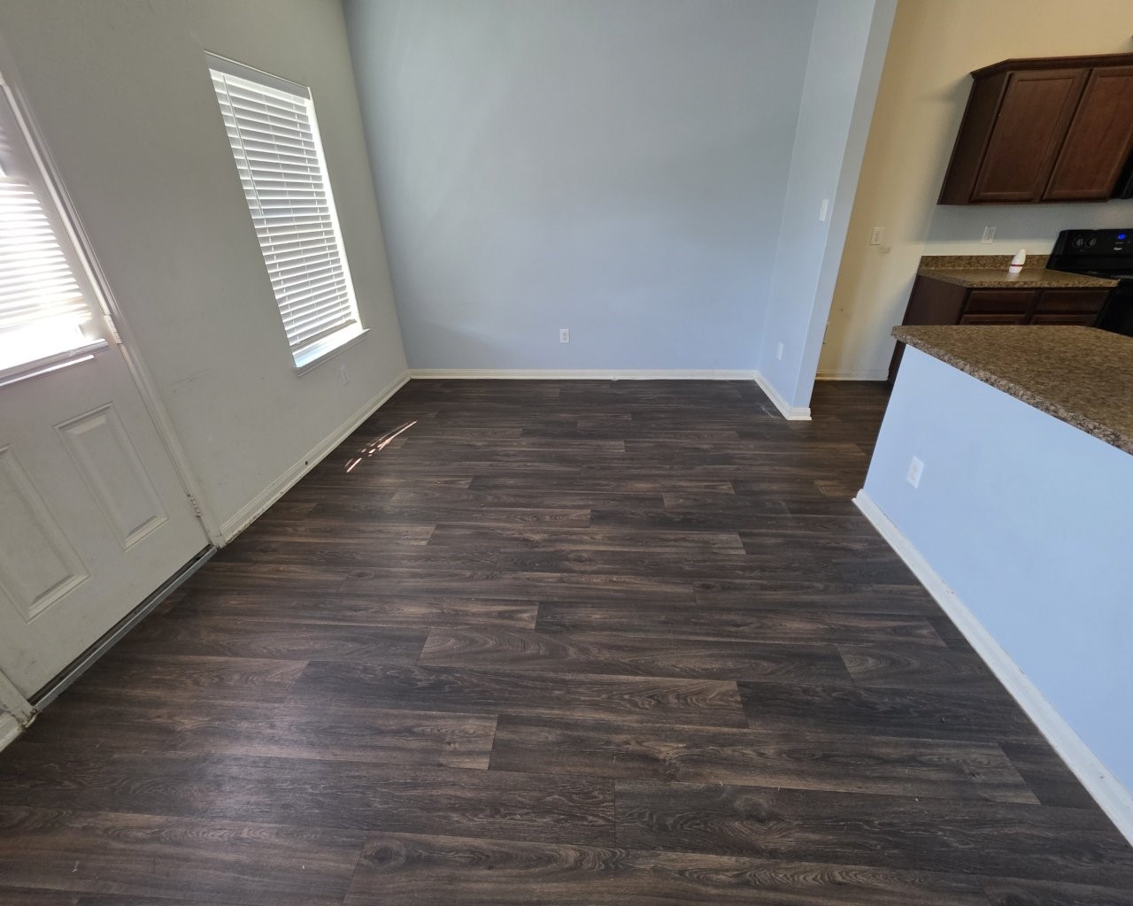 2709 Calypso Place La Marque, TX 77568 - Photo 7 of 21 a view of a kitchen with wooden floor and a sink