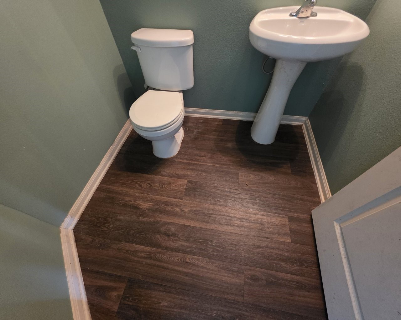 2709 Calypso Place La Marque, TX 77568 - Photo 8 of 21 a bathroom with a toilet and a sink