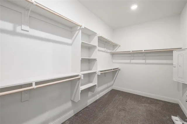 a view of an empty walk in closet