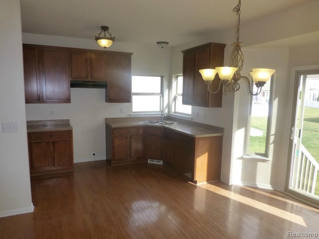 4010 Stone Post Road Newport, MI 48166 - Photo 8 of 27 Beautiful Kitchen w/ Great H/W Floors!