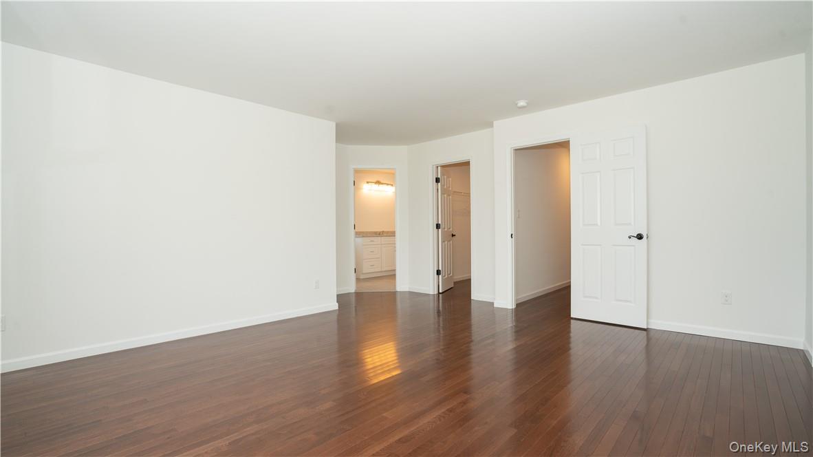 475 Du Bois Road Wallkill, NY 12589 - Photo 18 of 35 a view of an empty room with wooden floor