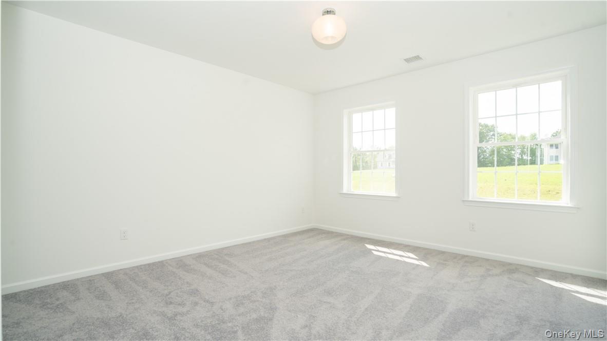 475 Du Bois Road Wallkill, NY 12589 - Photo 26 of 35 an empty room with windows