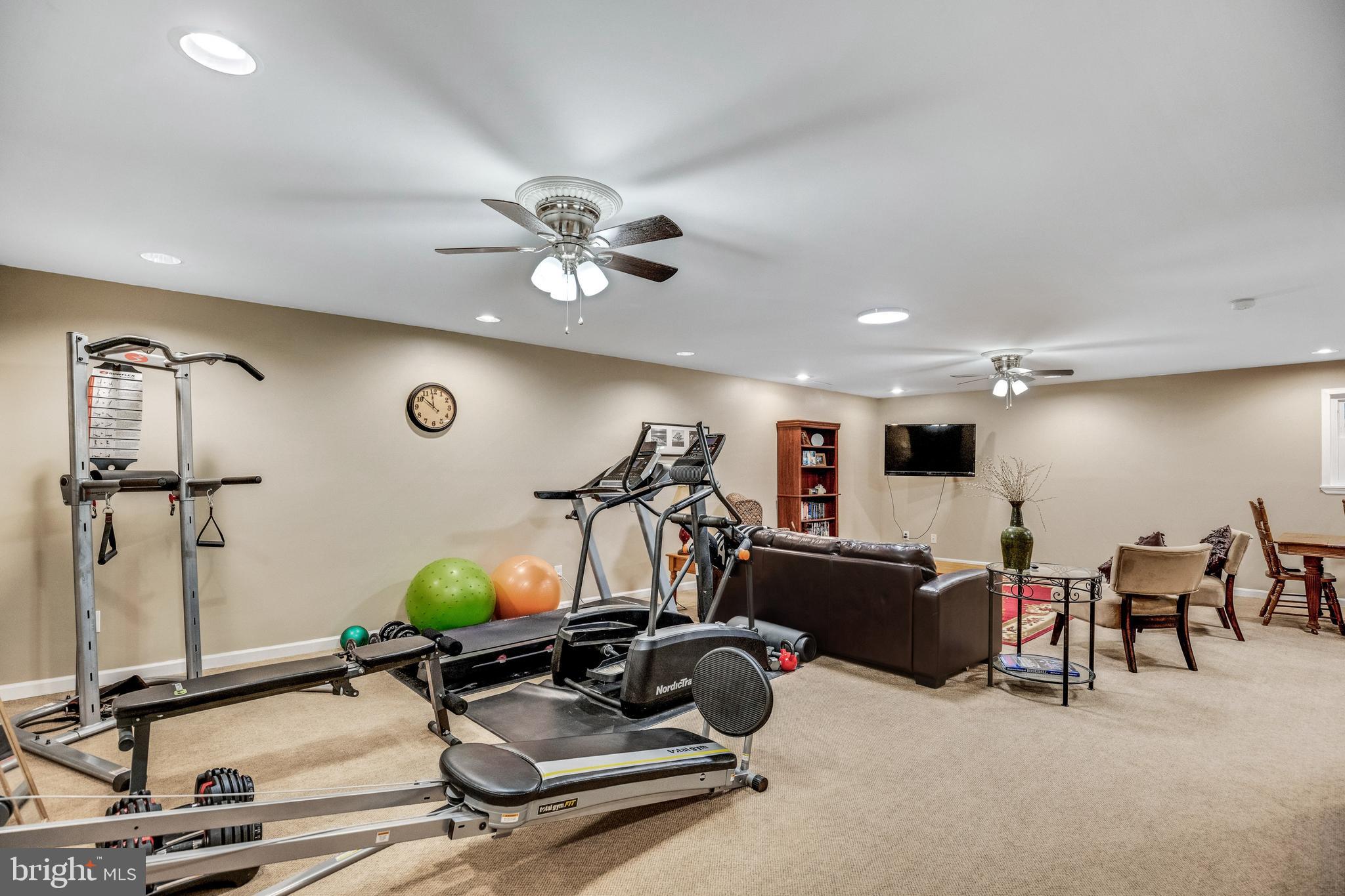 920 Carson Road Huntingtown, MD 20639 - Photo 20 of 32 a view of a room with gym equipment