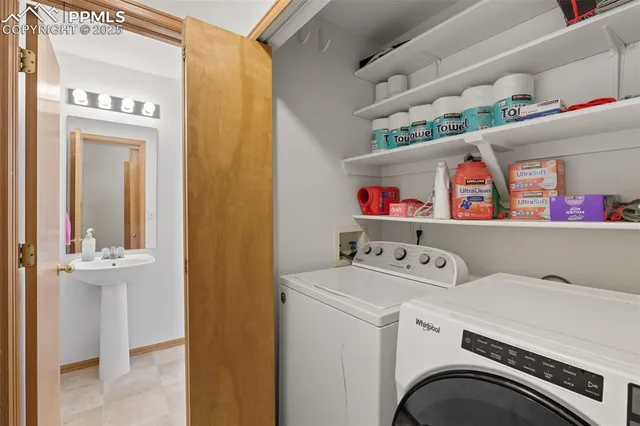 a utility room with dryer and washer