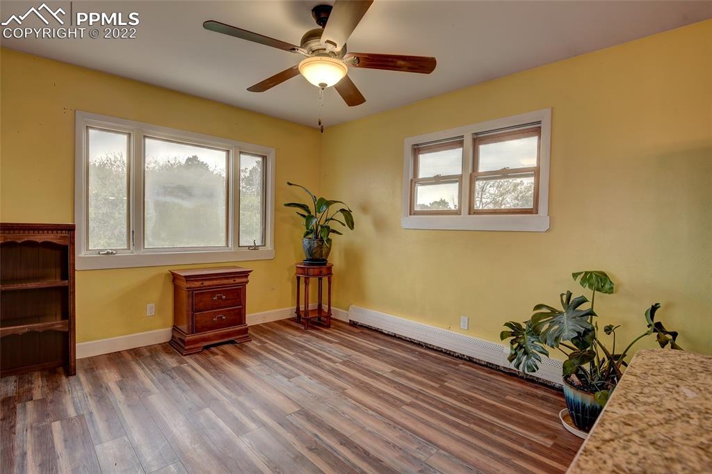 37550 Highway 94 Yoder, CO 80864 - Photo 11 of 39 a bedroom with furniture and a window