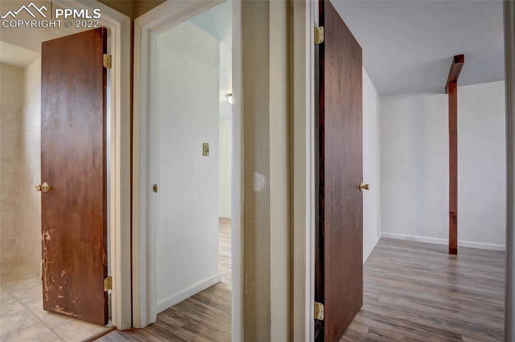 37550 Highway 94 Yoder, CO 80864 - Photo 23 of 39 a view of a hallway with wooden floor