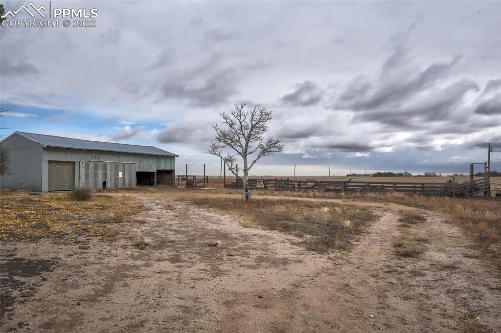 37550 Highway 94 Yoder, CO 80864 - Photo 33 of 39 a view of a house with a yard and chandelier