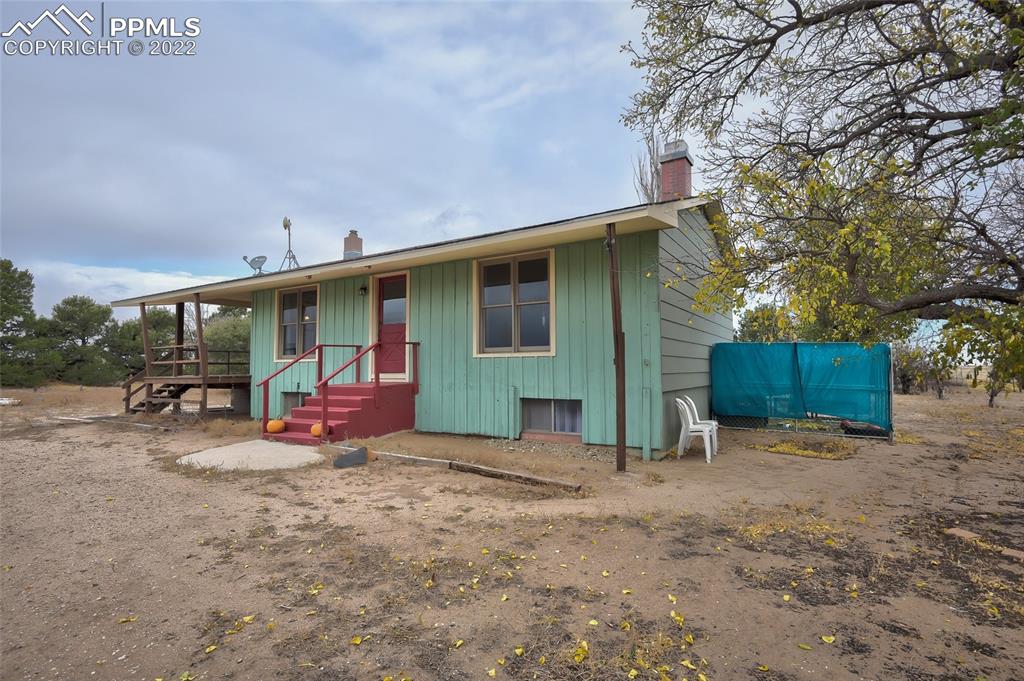37550 Highway 94 Yoder, CO 80864 - Photo 4 of 39 a view of a house with backyard porch and sitting area