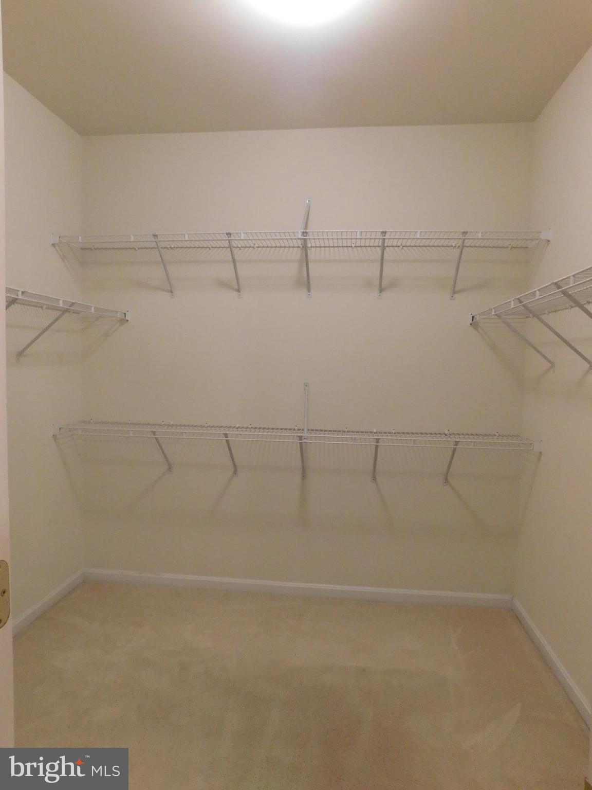 14162 Foxhall Road, Unit 4 Dowell, MD 20629 - Photo 13 of 24 a bathroom with a bathtub