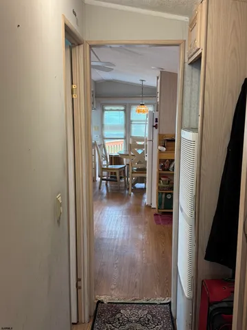 a bathroom with a granite countertop shower and a toilet