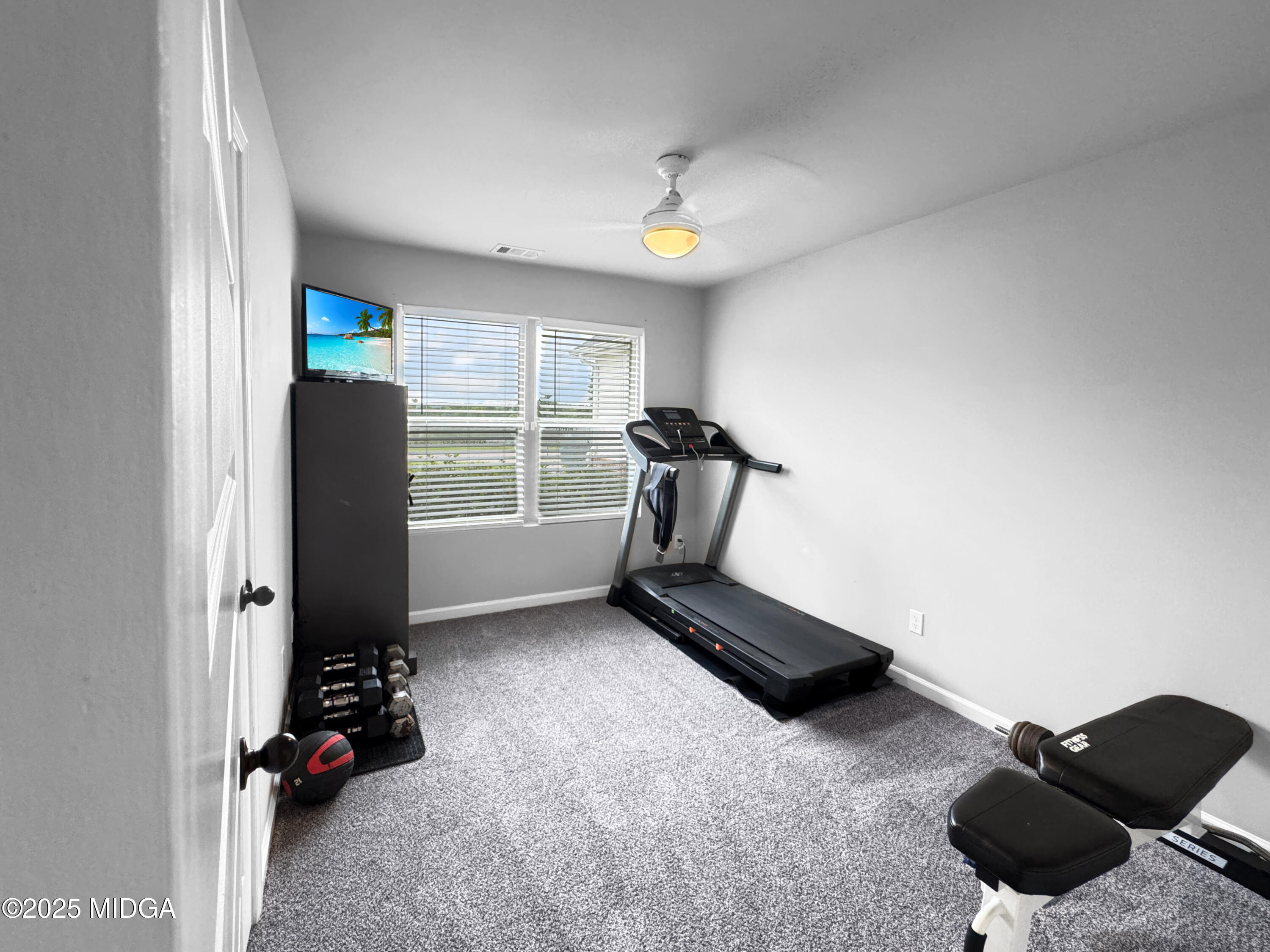 837 Weldon Road Forsyth, GA 31029 - Photo 16 of 24 a view of workspace with furniture and windows