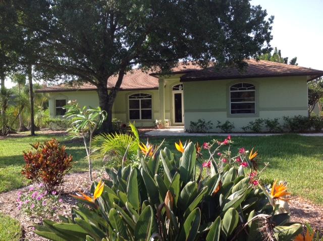 12654 154th Road North Jupiter, FL 33478 - Photo 1 of 43 Front Exterior