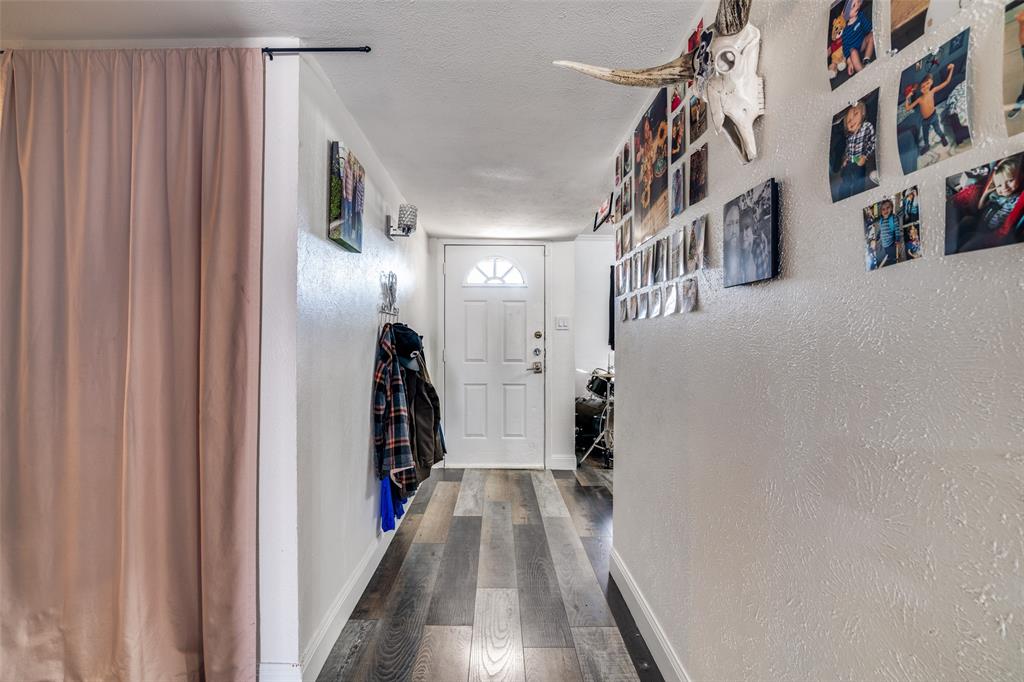 5610 Magnolia Lane Rowlett, TX 75089 - Photo 3 of 25 a view of hallway with stairs