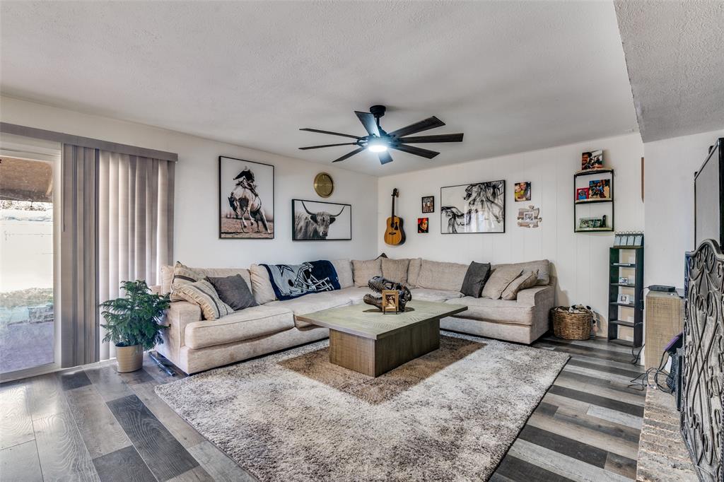 5610 Magnolia Lane Rowlett, TX 75089 - Photo 6 of 25 a living room with furniture and a large window
