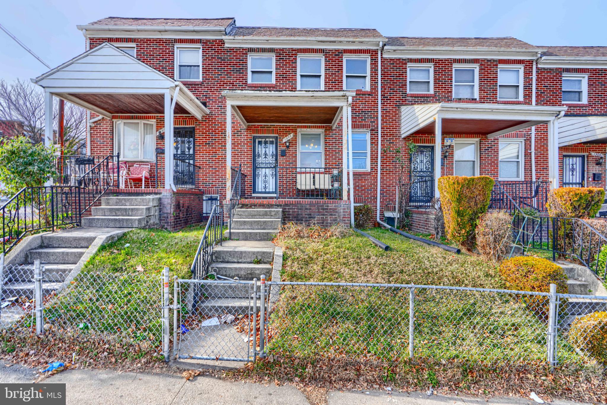 1302 Edison Highway Baltimore, MD 21213 - Photo 3 of 27 front view of house with a yard