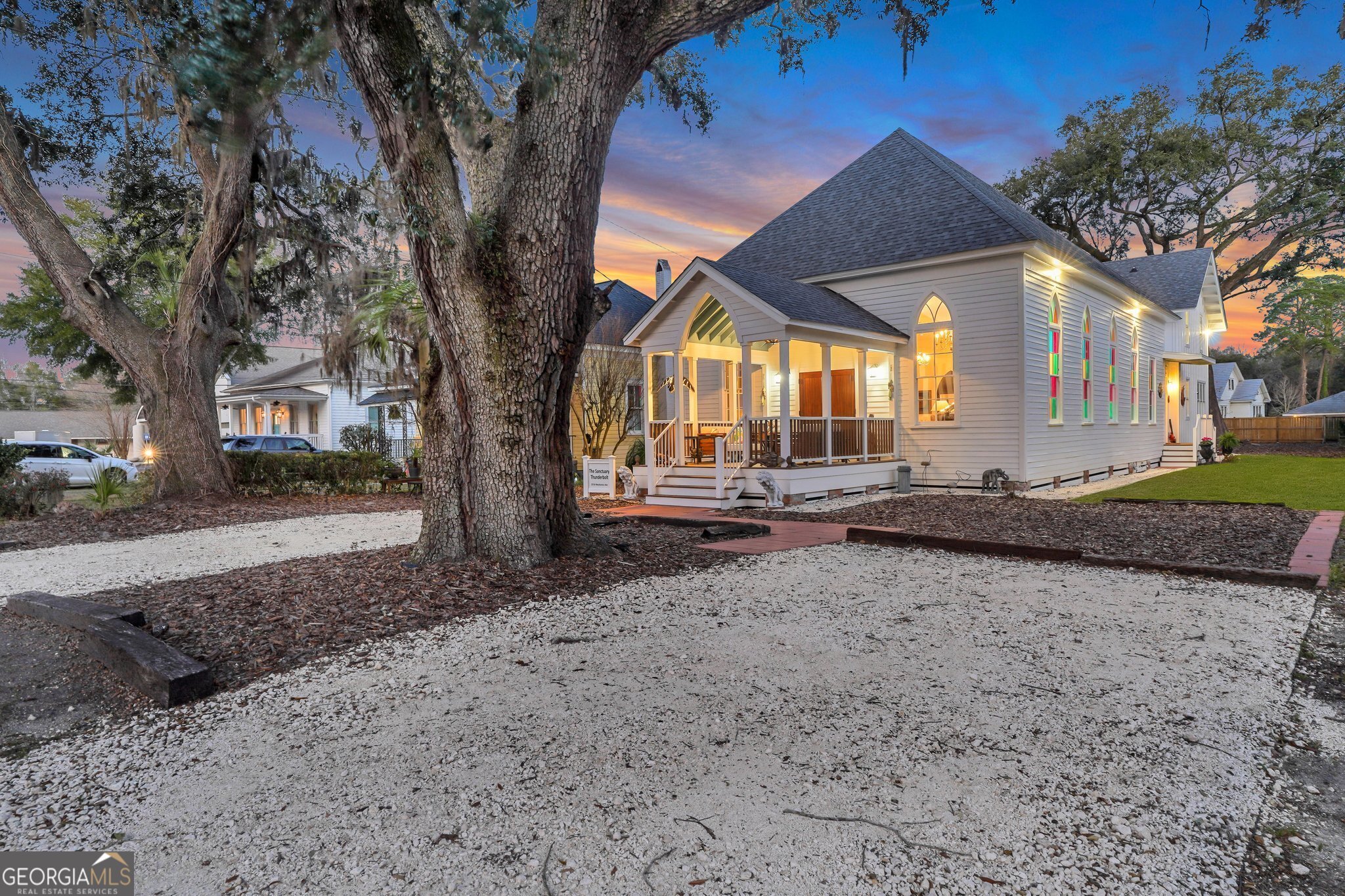 2716 Mechanics Avenue Thunderbolt, GA 31404 - Photo 1 of 50 a front view of a house with a yard
