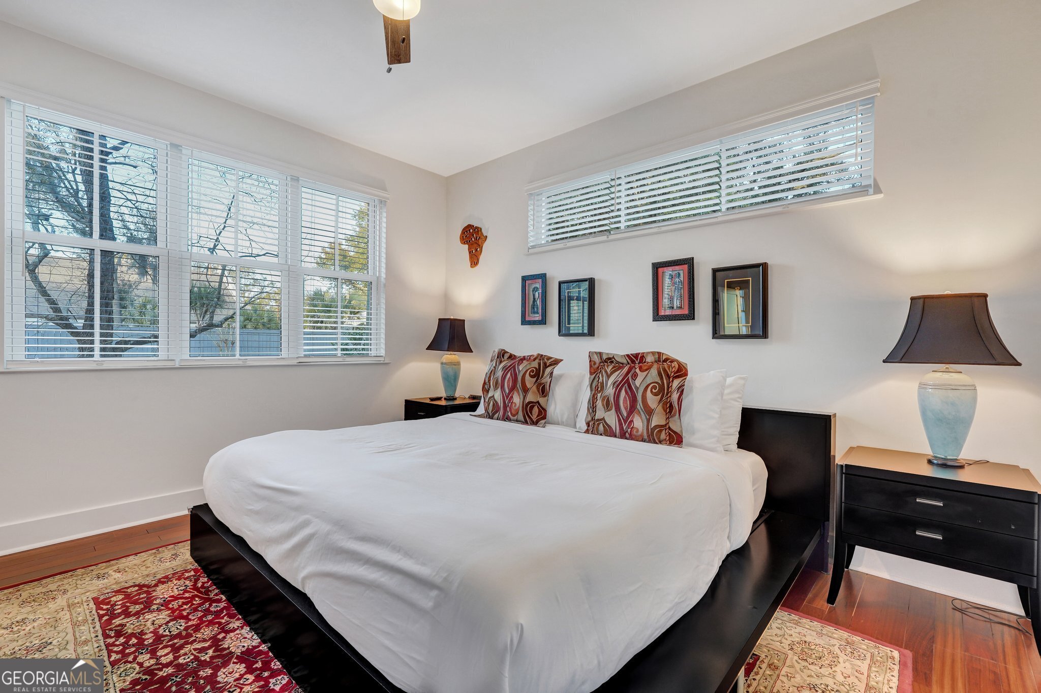 2716 Mechanics Avenue Thunderbolt, GA 31404 - Photo 27 of 50 a bedroom with double bed and a lamp