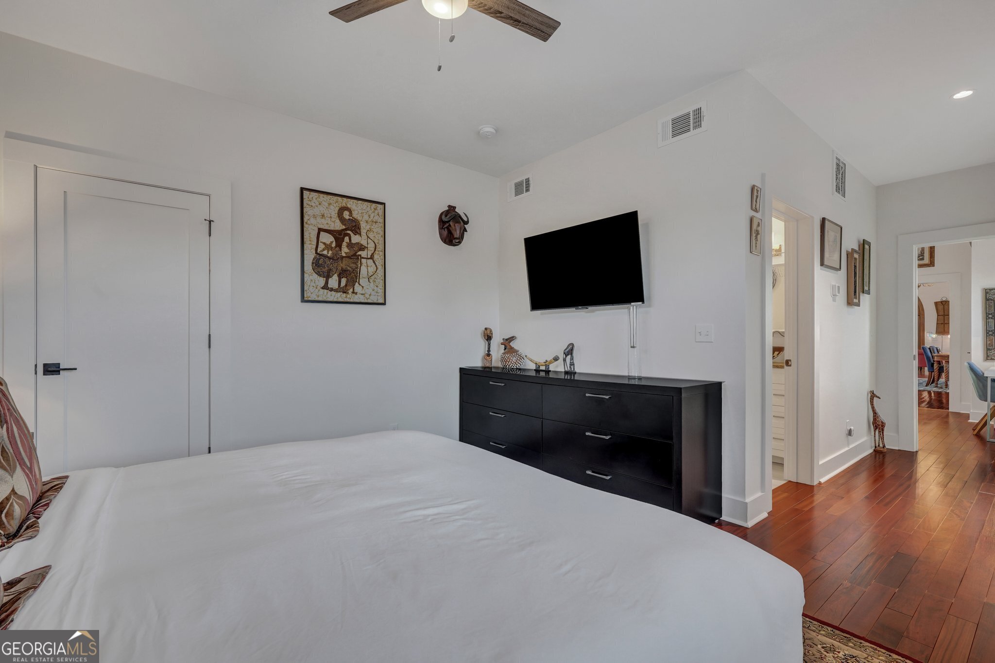 2716 Mechanics Avenue Thunderbolt, GA 31404 - Photo 28 of 50 a bedroom with a bed and a flat screen tv