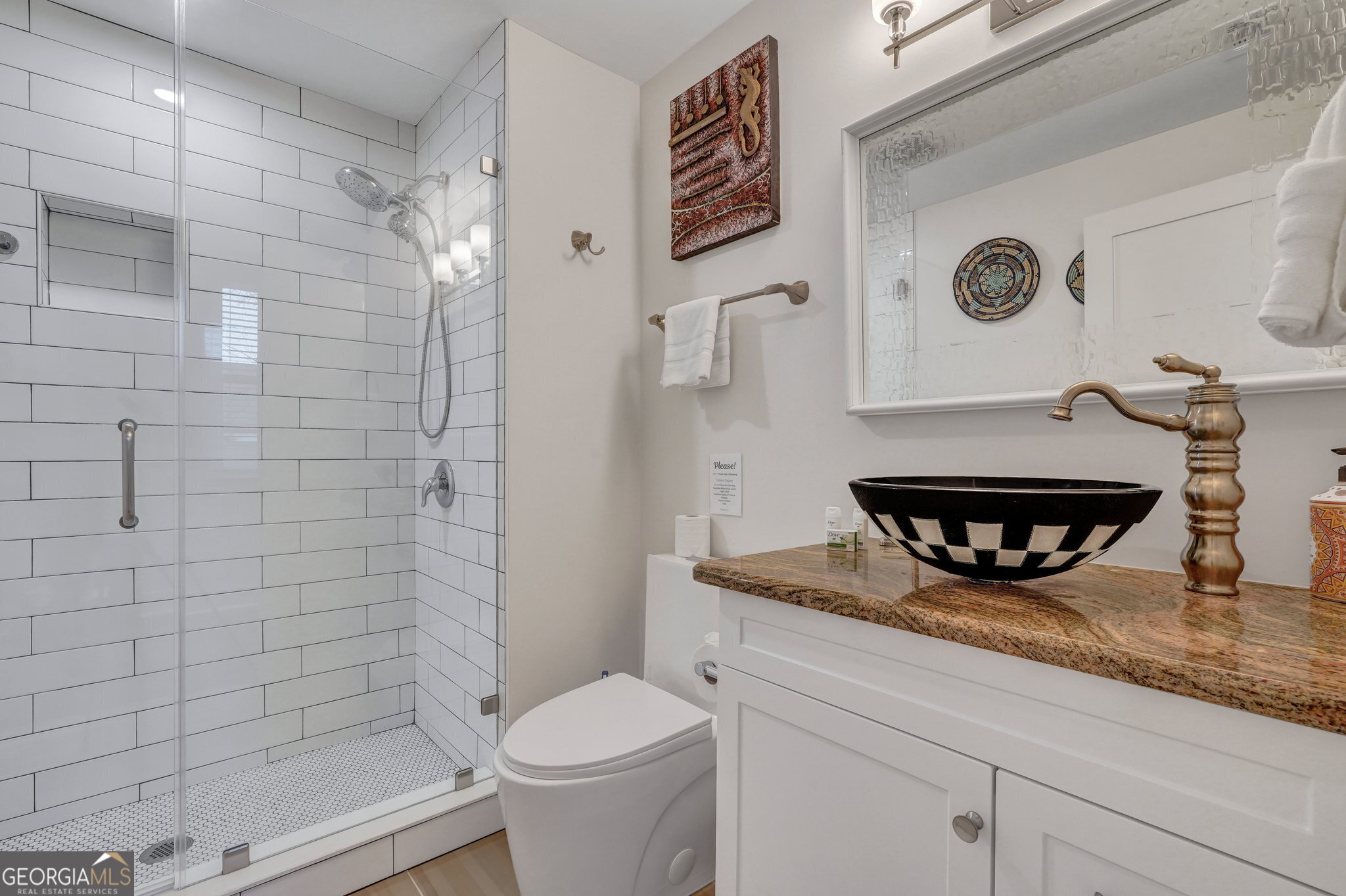 2716 Mechanics Avenue Thunderbolt, GA 31404 - Photo 29 of 50 a bathroom with a granite countertop sink a toilet and shower