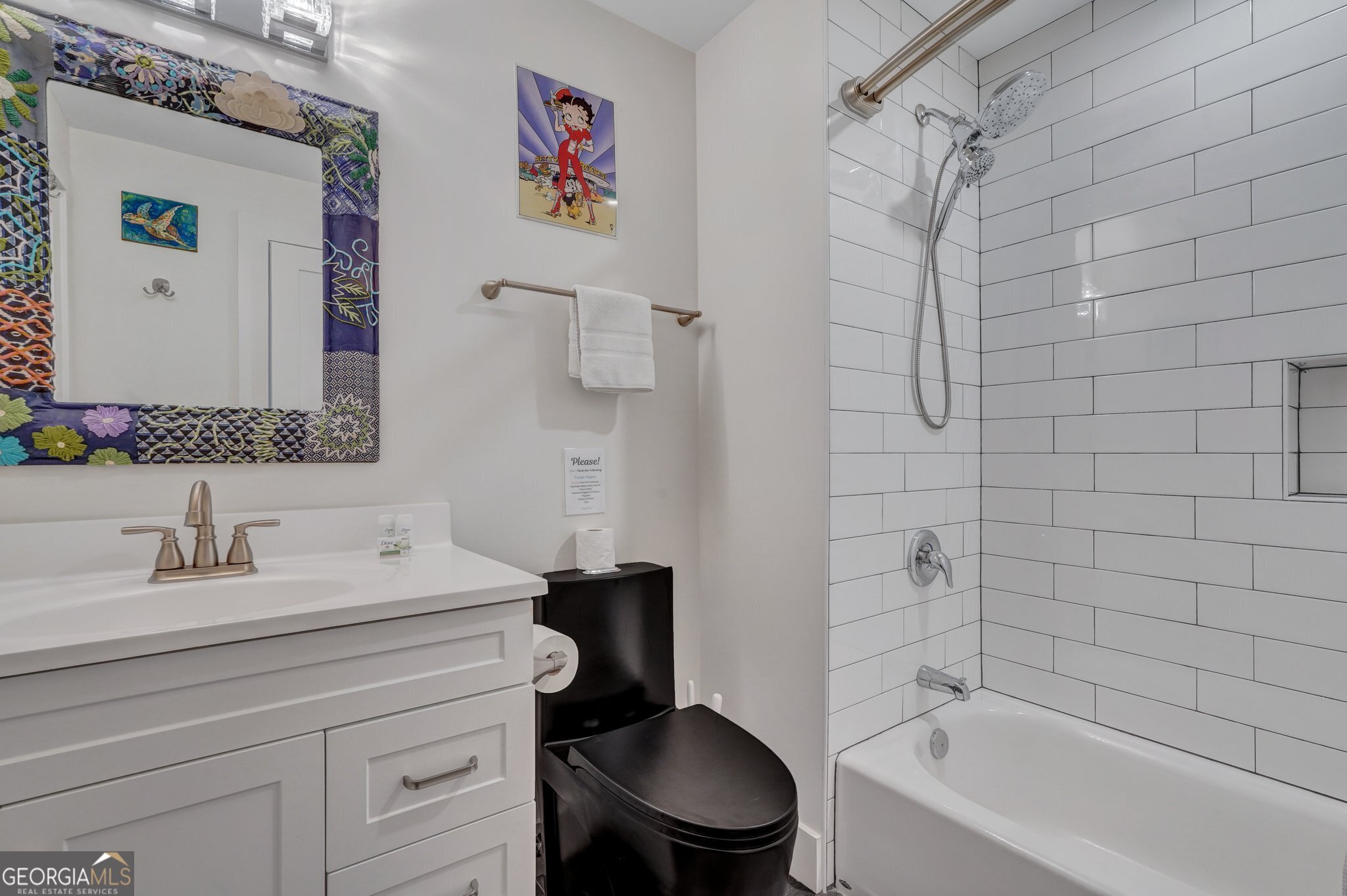 2716 Mechanics Avenue Thunderbolt, GA 31404 - Photo 33 of 50 a bathroom with a sink toilet and shower